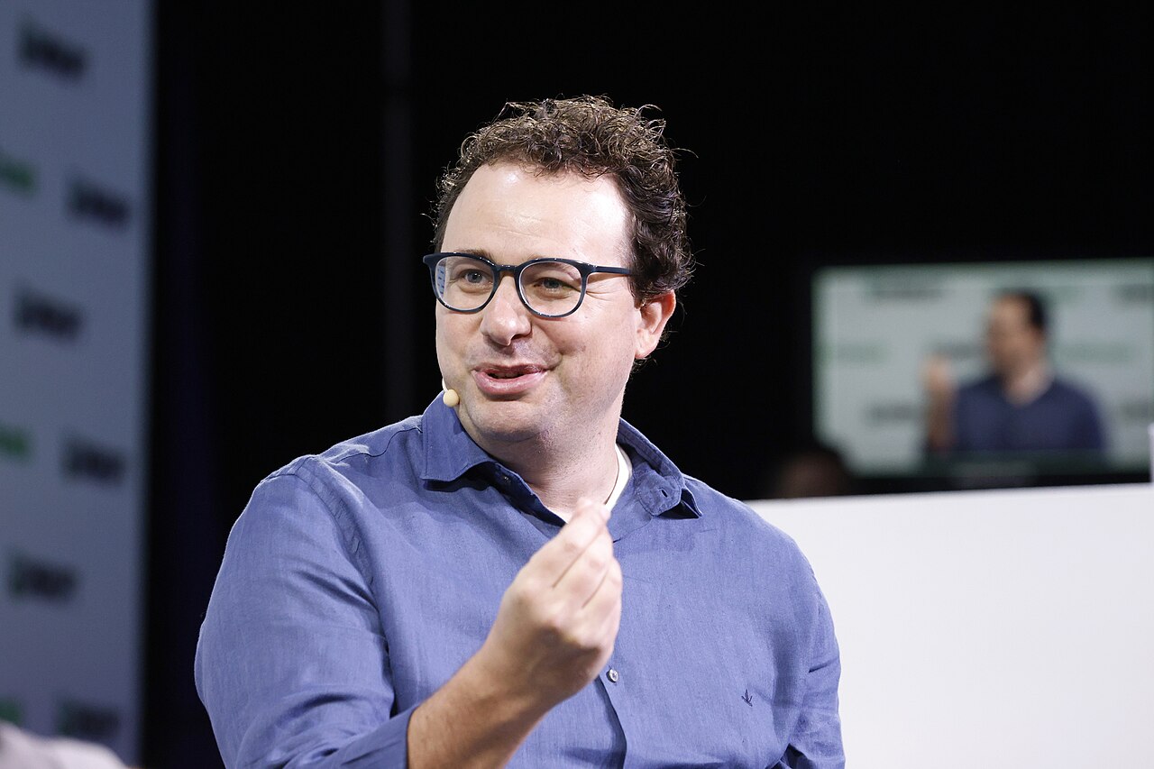 Dario Amodei speaking on stage