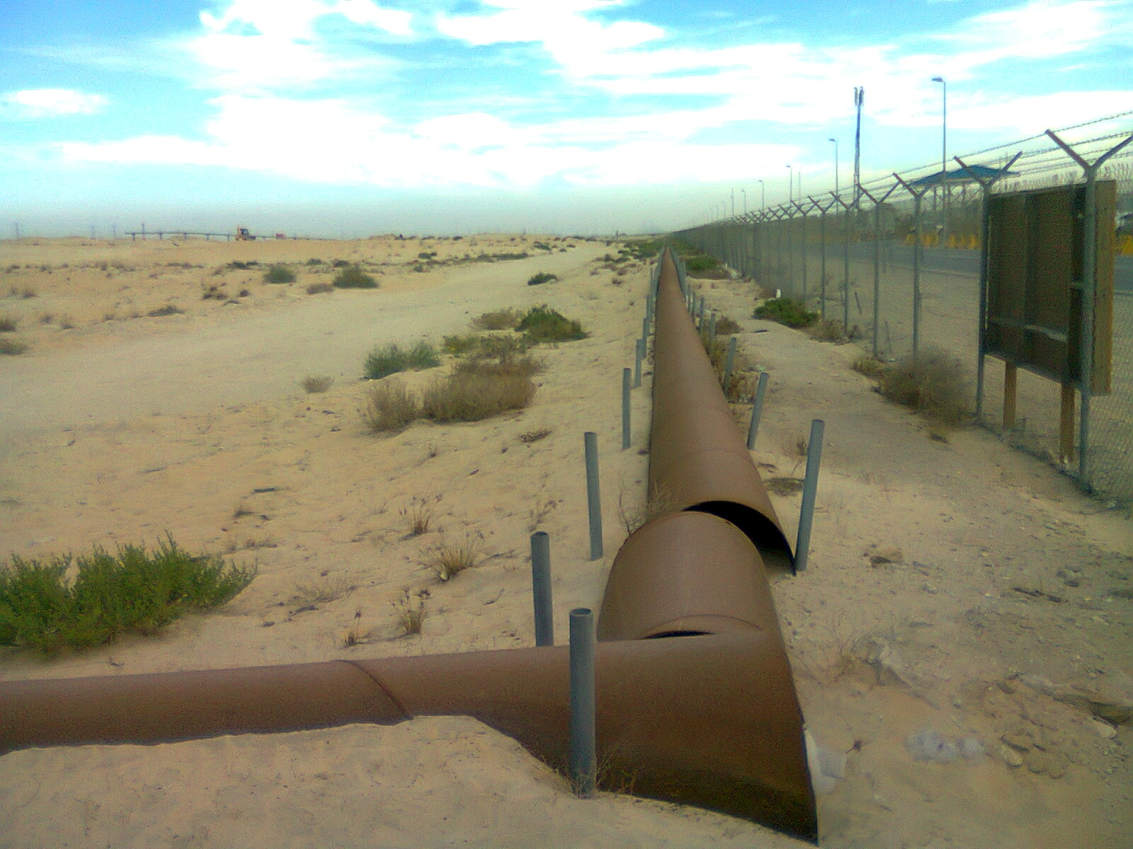 Crude oil pipelines running through desert near Jubail in Saudi Arabia's Eastern Province