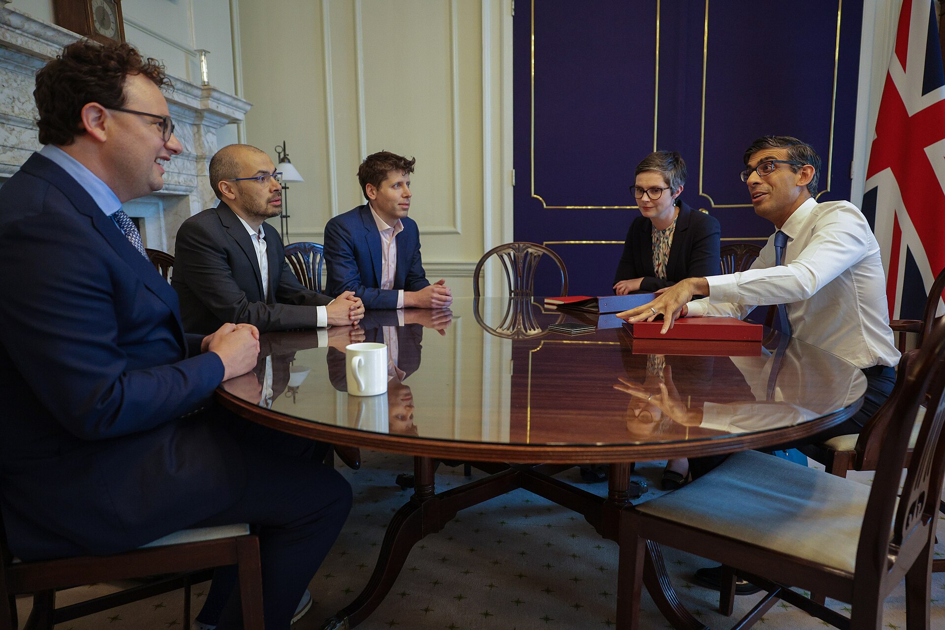 Demis Hassabis, Dario Amodei and Sam Altman seated with the British prime minister in Downing Street, May 2023.